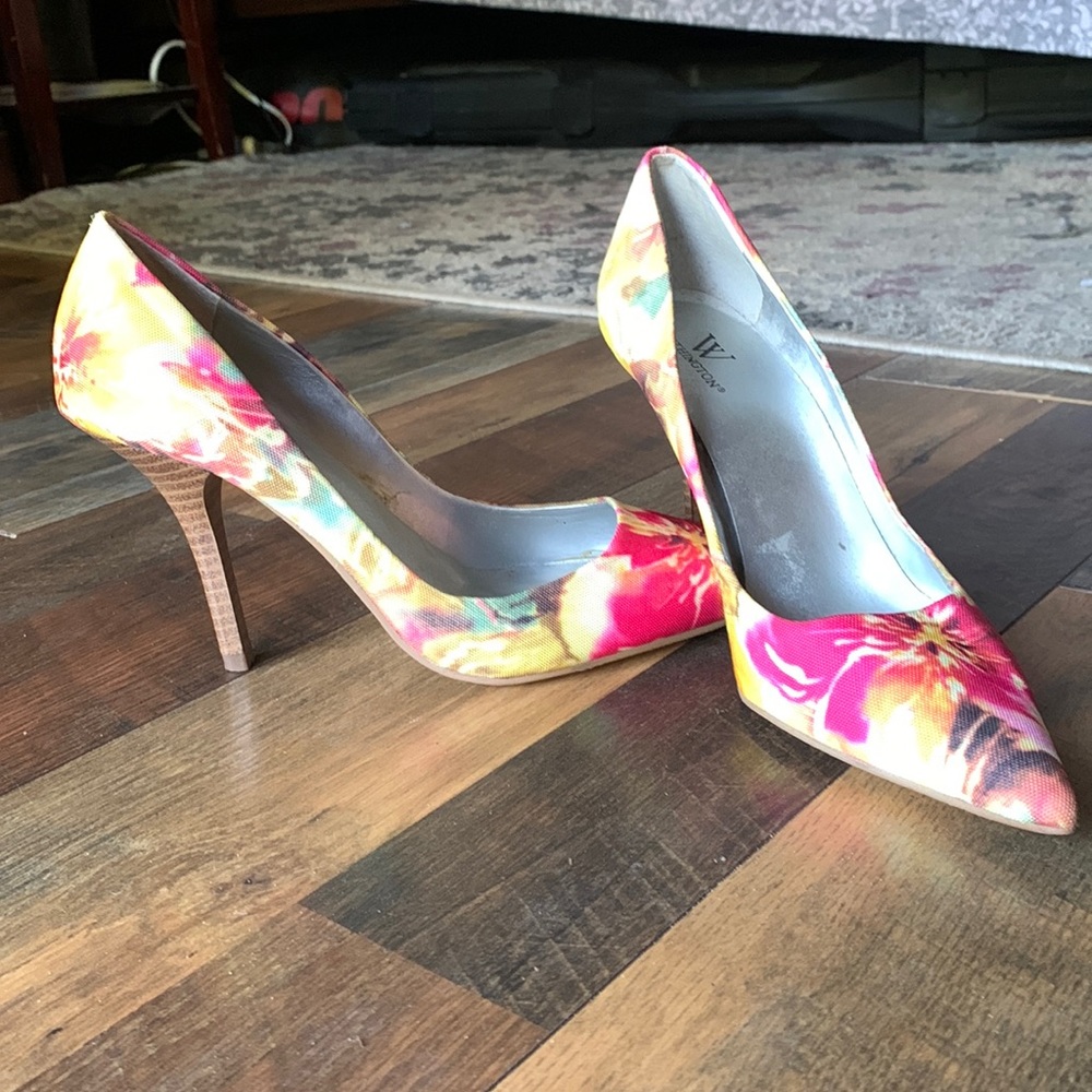 Floral with open inside and wooden heel.Spring colors. Lightly worn for teaching